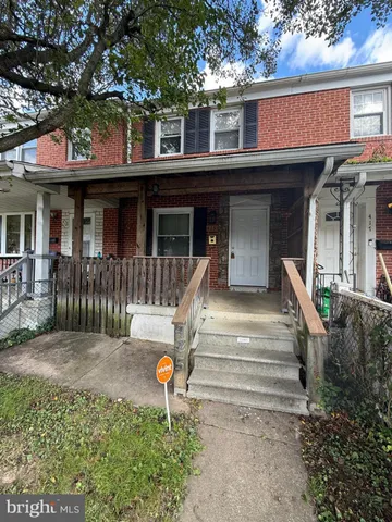 a front view of a house with a porch