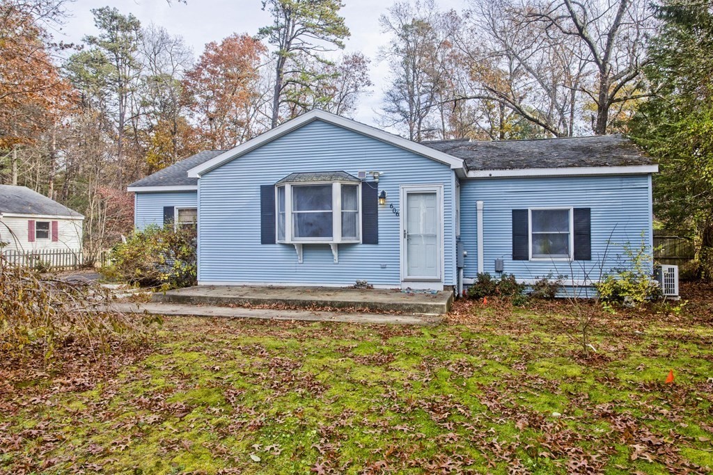 606 County Road Holyoke, MA 01040 - Photo 1 of 20 a front view of house with yard and trees around