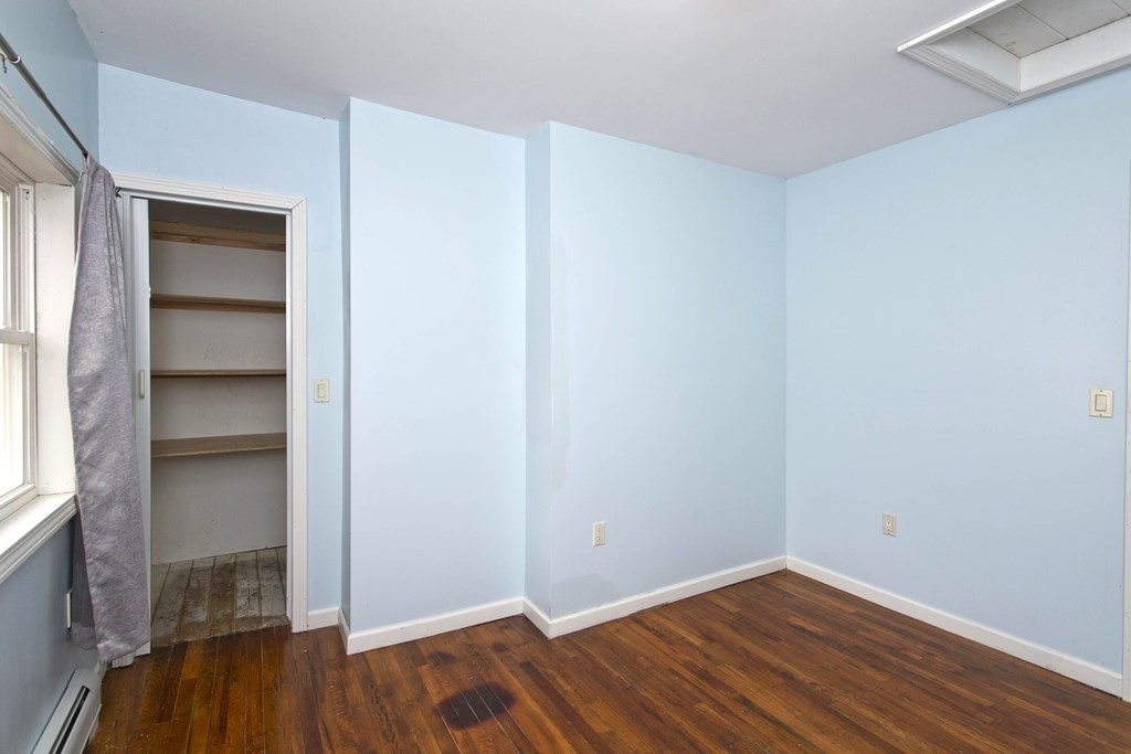 606 County Road Holyoke, MA 01040 - Photo 18 of 20 a view of a room with wooden floor and closet