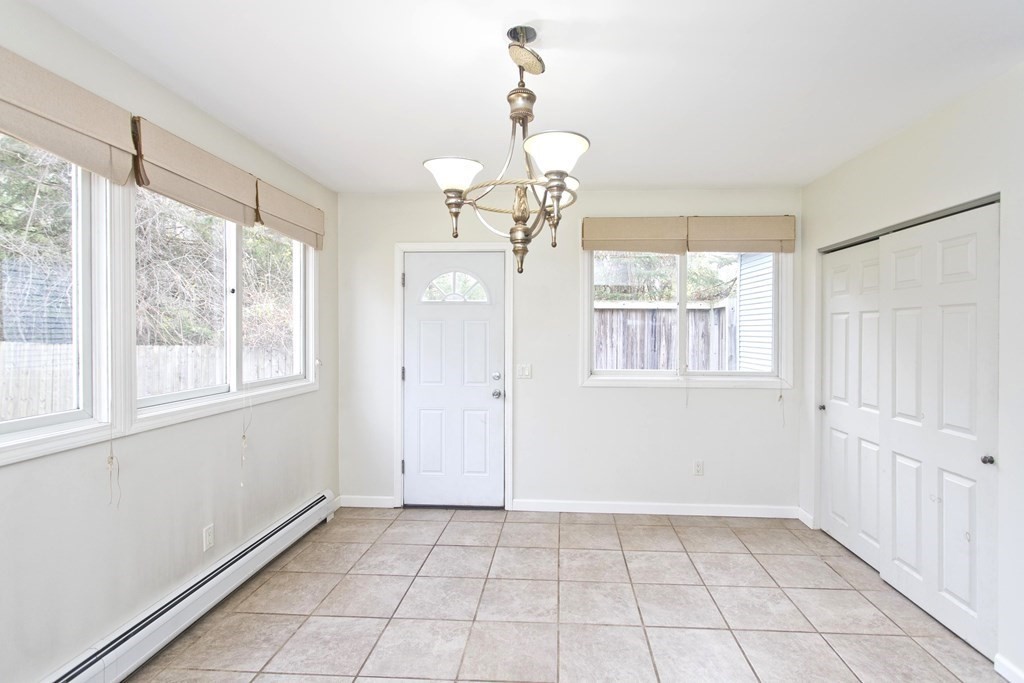 606 County Road Holyoke, MA 01040 - Photo 5 of 20 a view of an empty room with a window