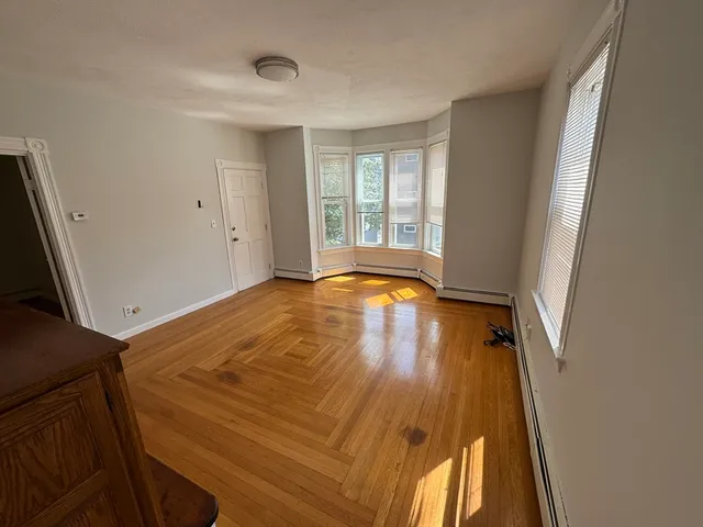 a kitchen with sink and refrigerator