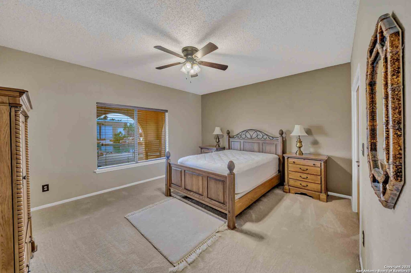 8300 Scr 314 Rocksprings, TX 78880 - Photo 37 of 74 a bedroom with a bed and a chandelier