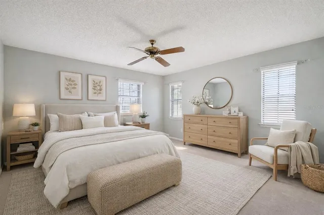 a bed room with bed and window