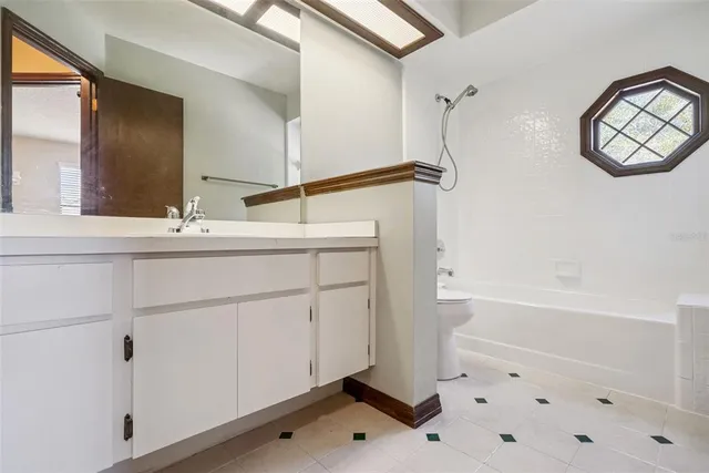 a bathroom with a sink and a bathtub