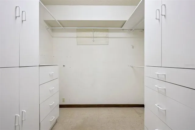 a view of an empty walk in closet