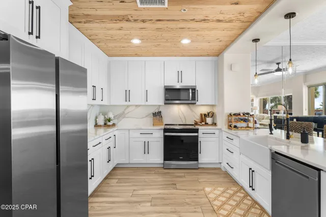 $1,249,900 | 7115 Thomas Drive, Unit 104, Panama City, FL 32408