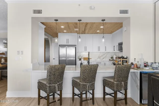 $1,249,900 | 7115 Thomas Drive, Unit 104, Panama City, FL 32408