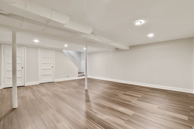 8012 Edgewater Road North Riverside, IL 60546 - Photo 14 of 22 an empty room with wooden floor closet and windows