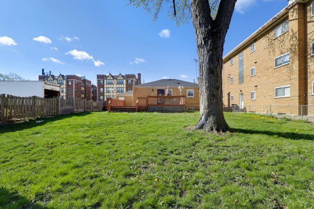 8012 Edgewater Road North Riverside, IL 60546 - Photo 3 of 22 a view of a garden with a building in the background