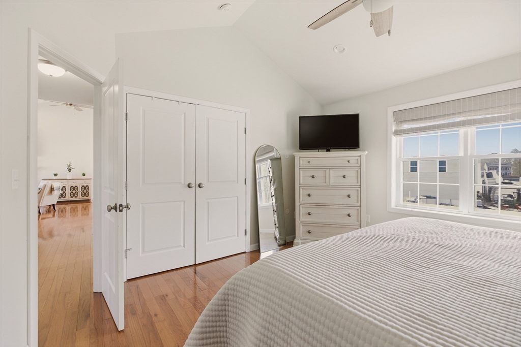 341 Courtney Street Fall River, MA 02720 - Photo 17 of 39 a bedroom with a bed and a flat screen tv