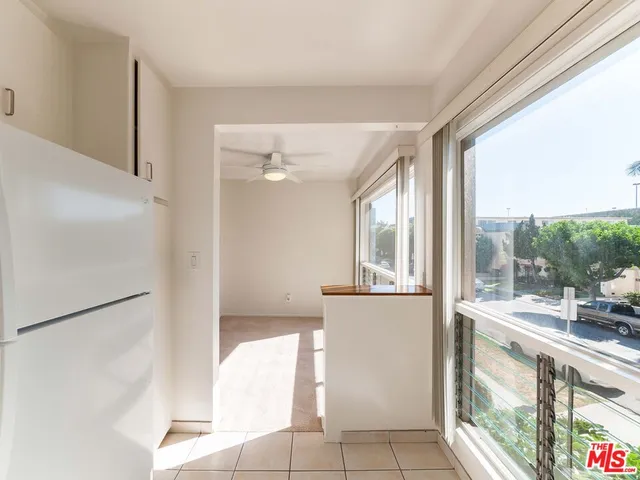 a view of living room with a large window