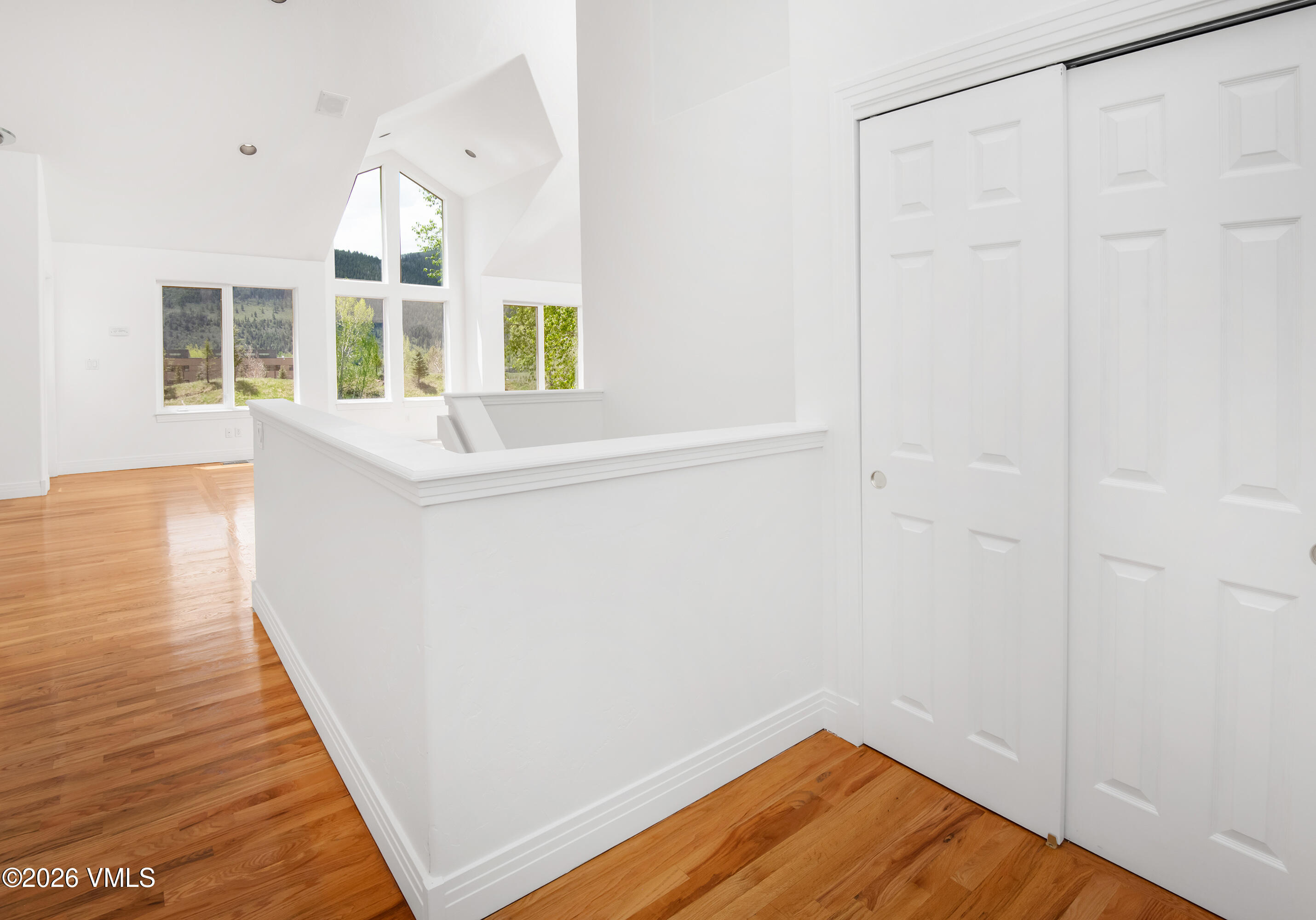 471 Rawhide Road Edwards, CO 81632 - Photo 15 of 51 a view of empty room with wooden floor and fan