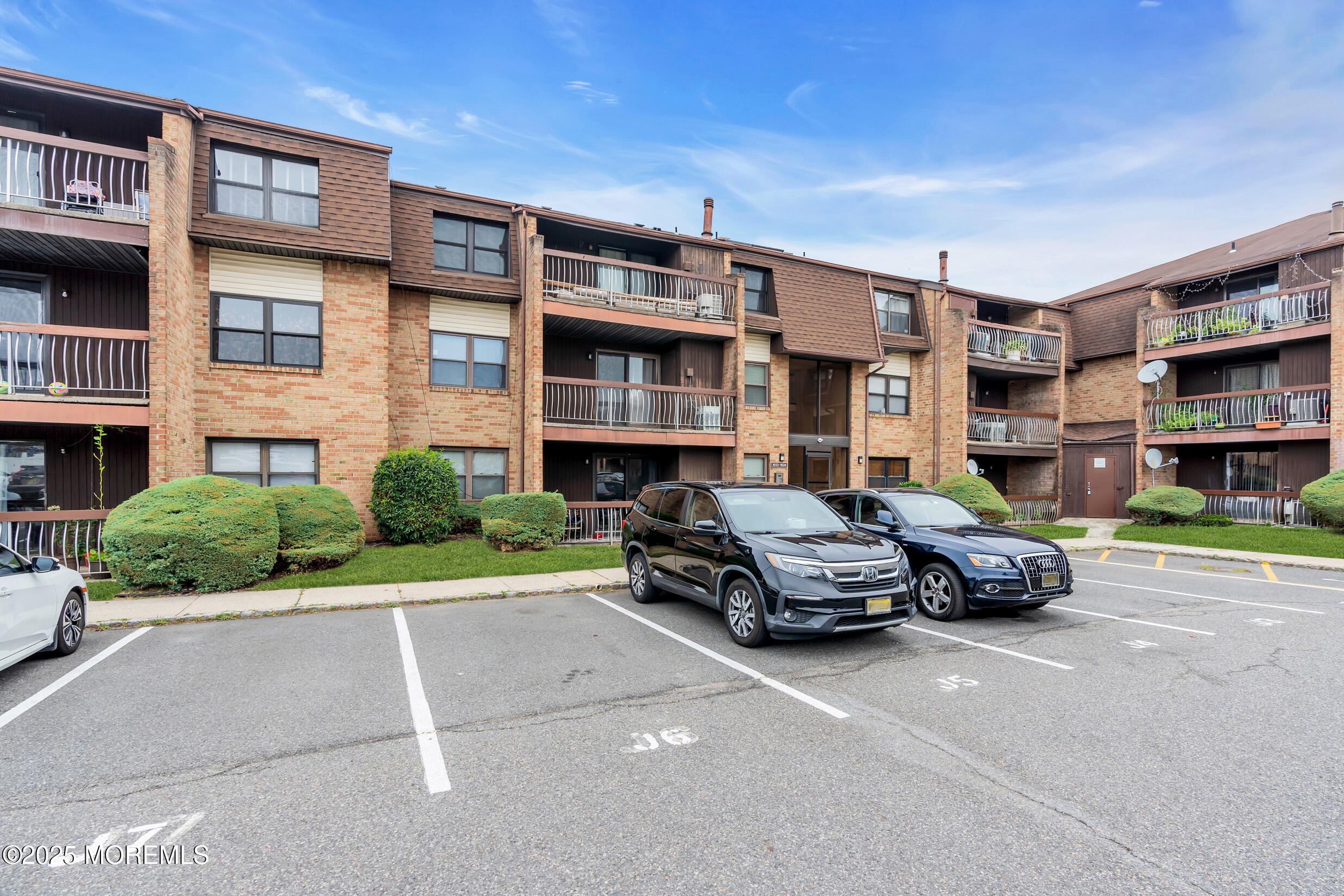 1617 Raspberry Court Edison, NJ 08817 - Photo 21 of 29 a car parked in front of a brick building