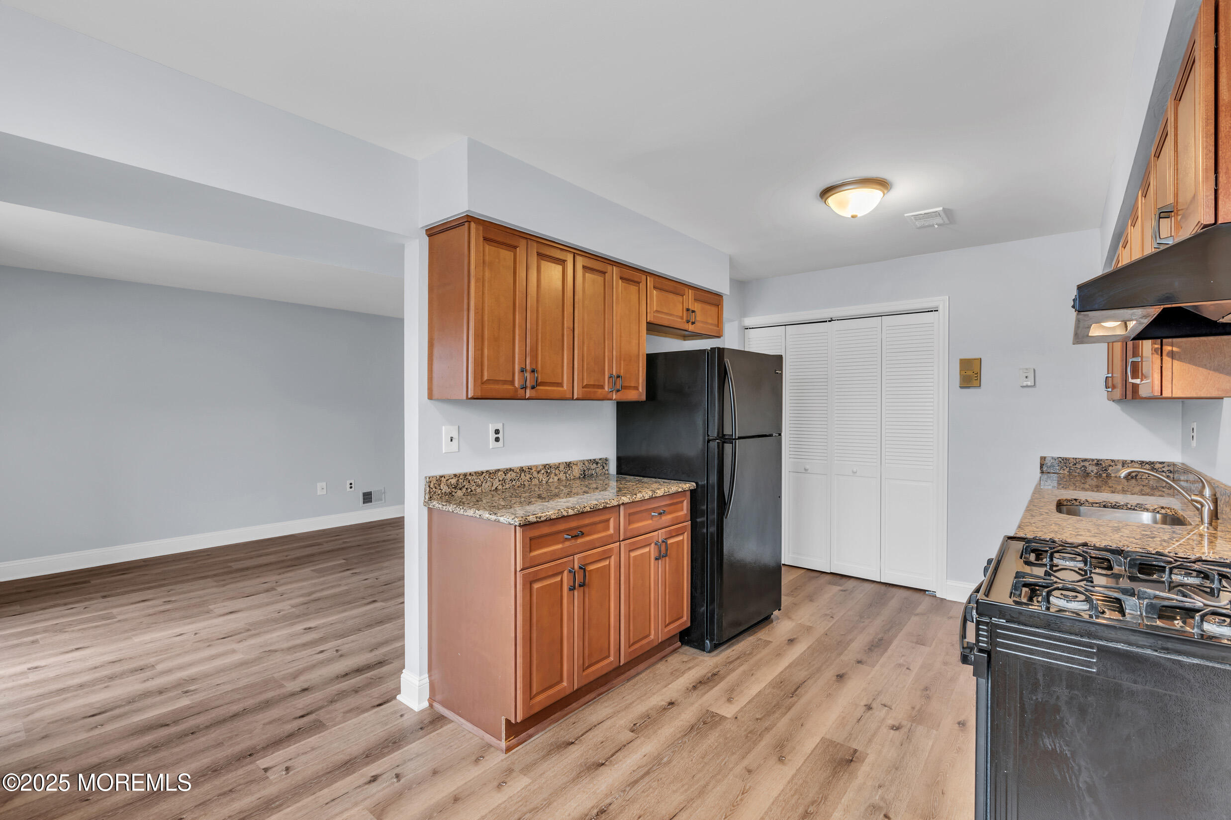 1617 Raspberry Court Edison, NJ 08817 - Photo 4 of 29 a kitchen with stainless steel appliances granite countertop a stove and a refrigerator
