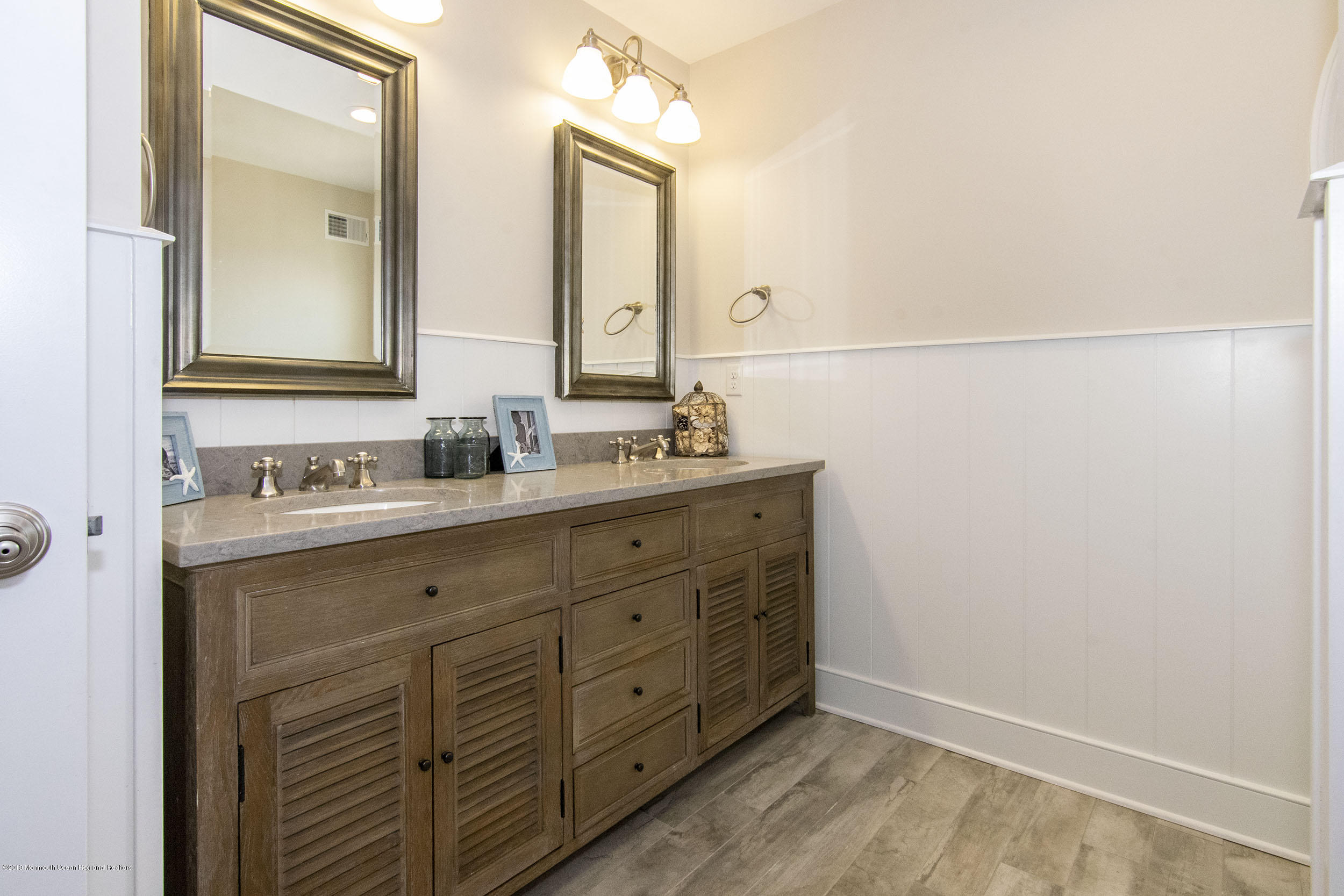 30 Ward Drive Brick, NJ 08723 - Photo 12 of 61 a bathroom with a double vanity sink and a mirror
