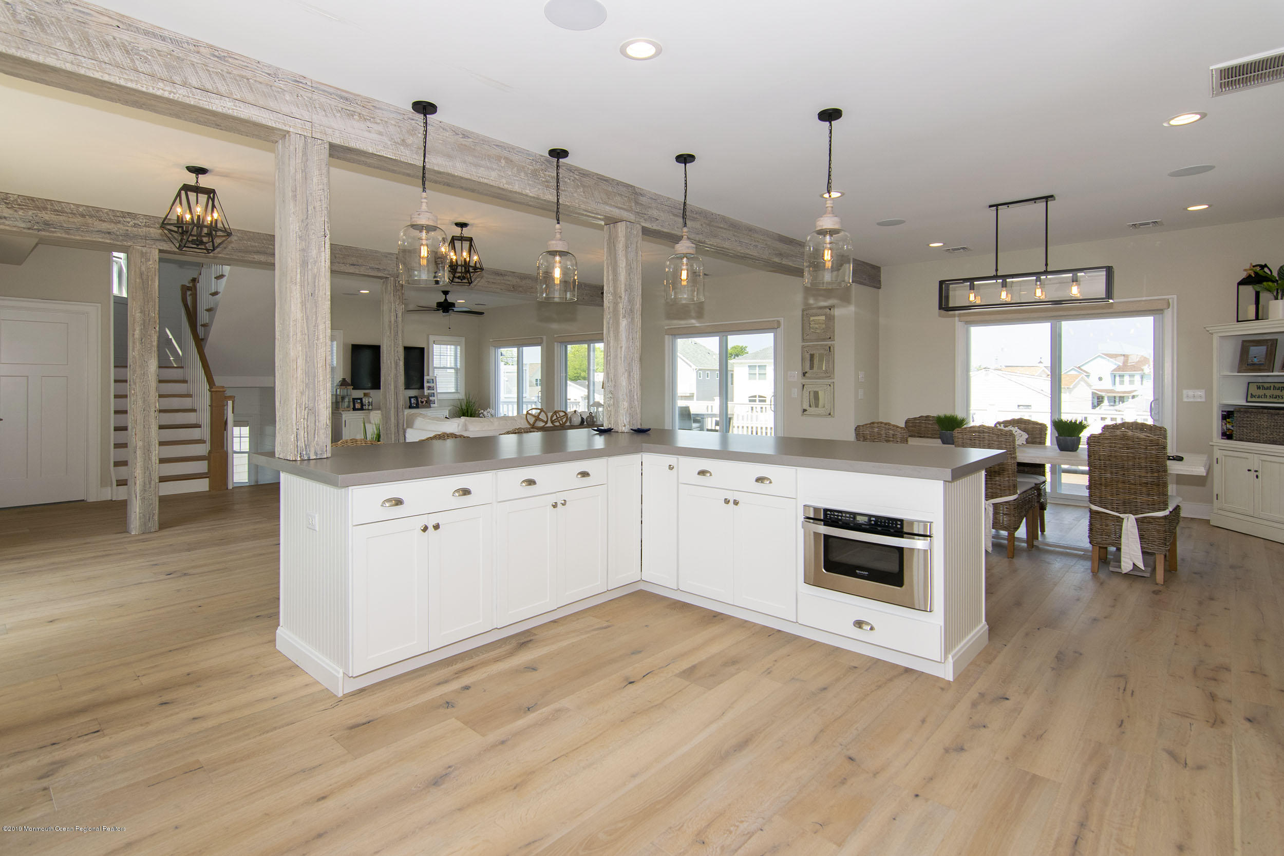 30 Ward Drive Brick, NJ 08723 - Photo 20 of 61 a large kitchen with kitchen island white cabinets and stainless steel appliances