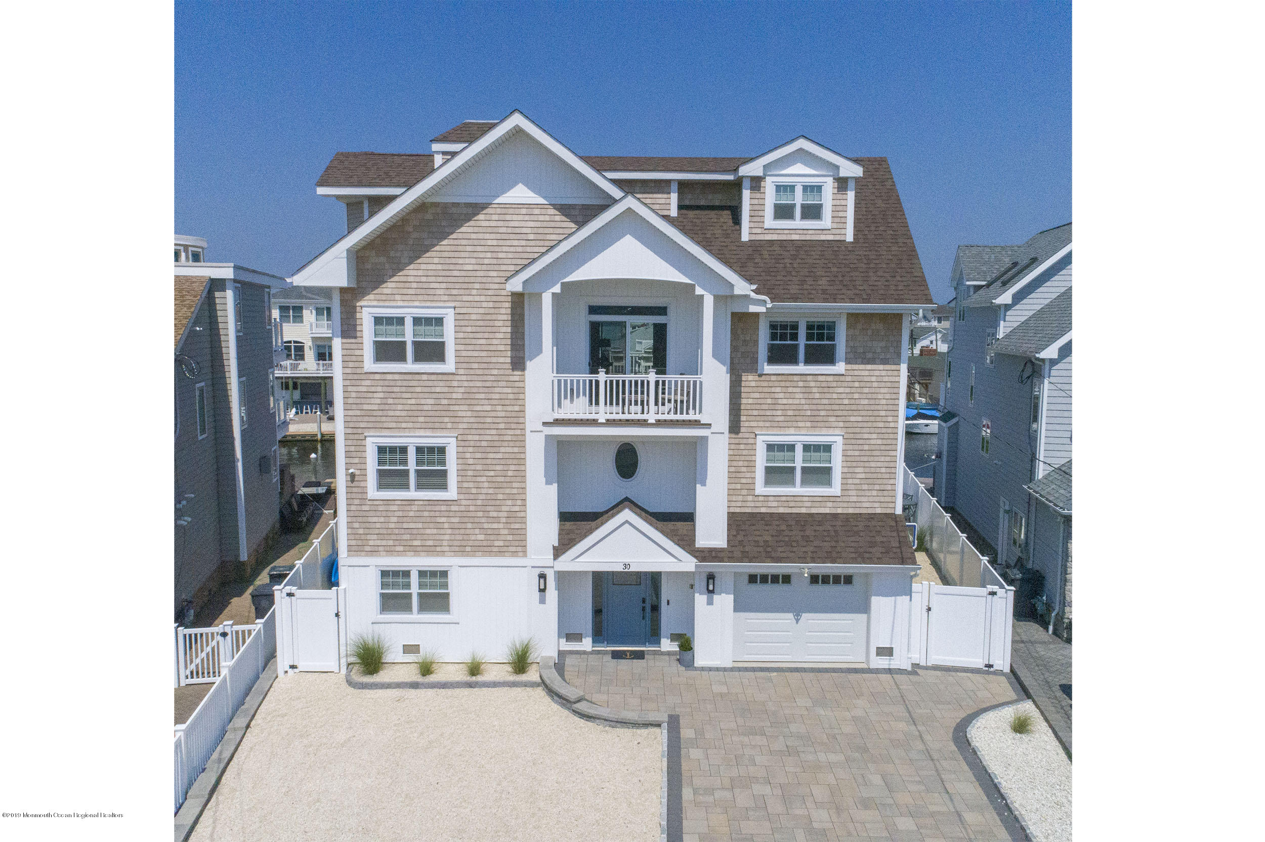 30 Ward Drive Brick, NJ 08723 - Photo 2 of 61 a front view of a house with a yard