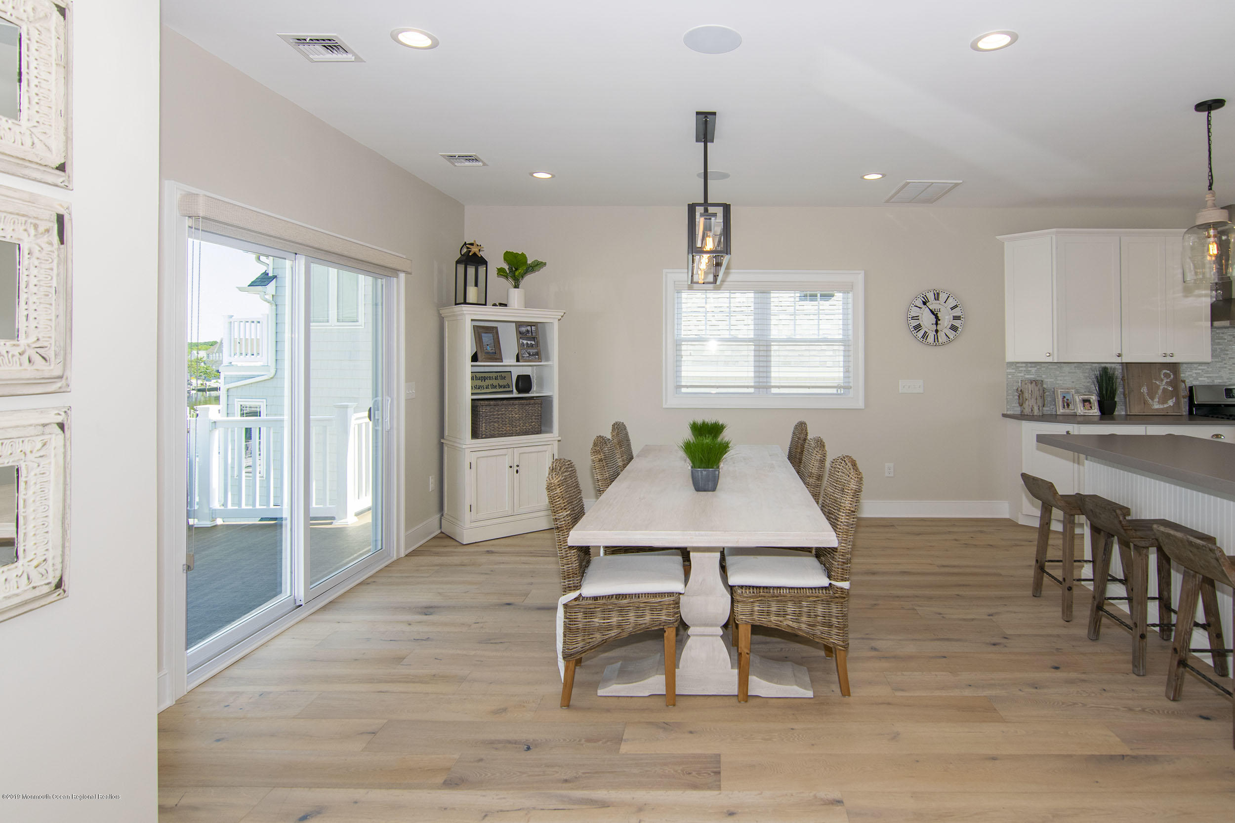 30 Ward Drive Brick, NJ 08723 - Photo 25 of 61 a kitchen with stainless steel appliances granite countertop a table chairs and a refrigerator