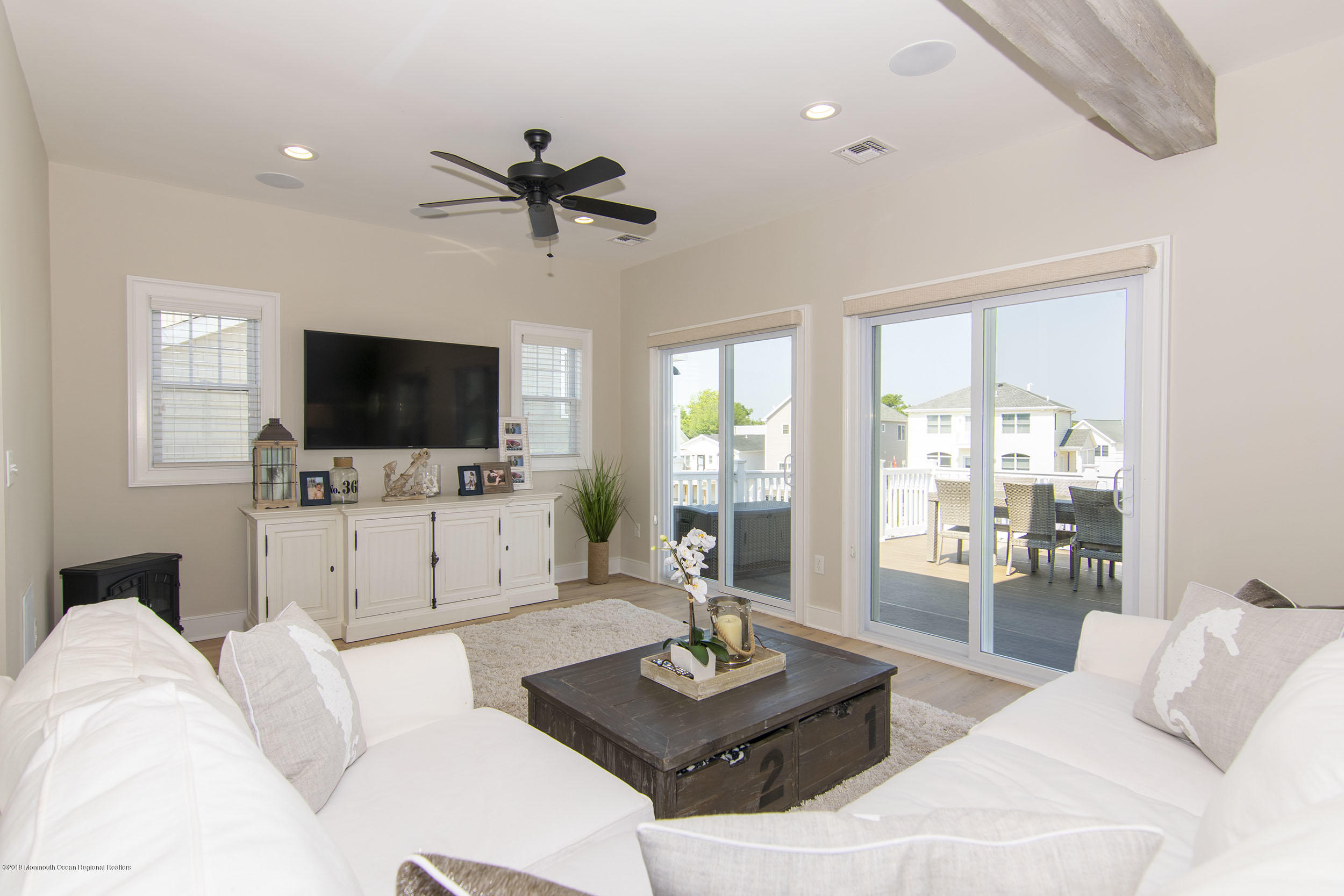 30 Ward Drive Brick, NJ 08723 - Photo 26 of 61 a living room with furniture and a flat screen tv