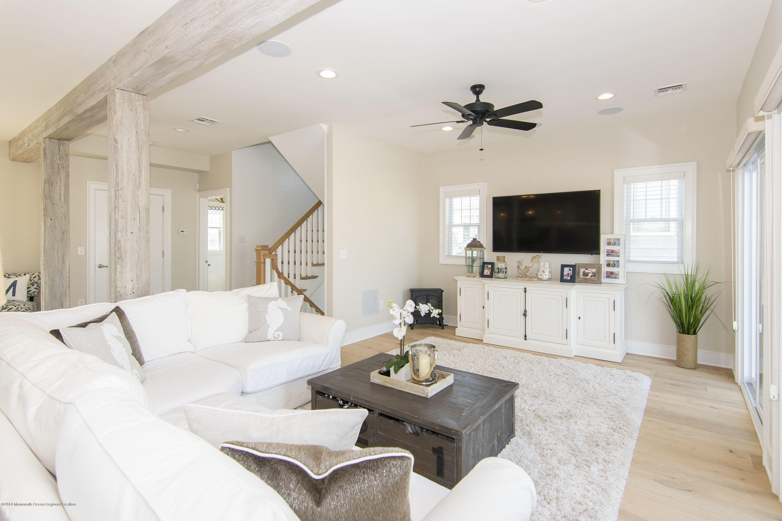 30 Ward Drive Brick, NJ 08723 - Photo 27 of 61 a living room with furniture and a flat screen tv