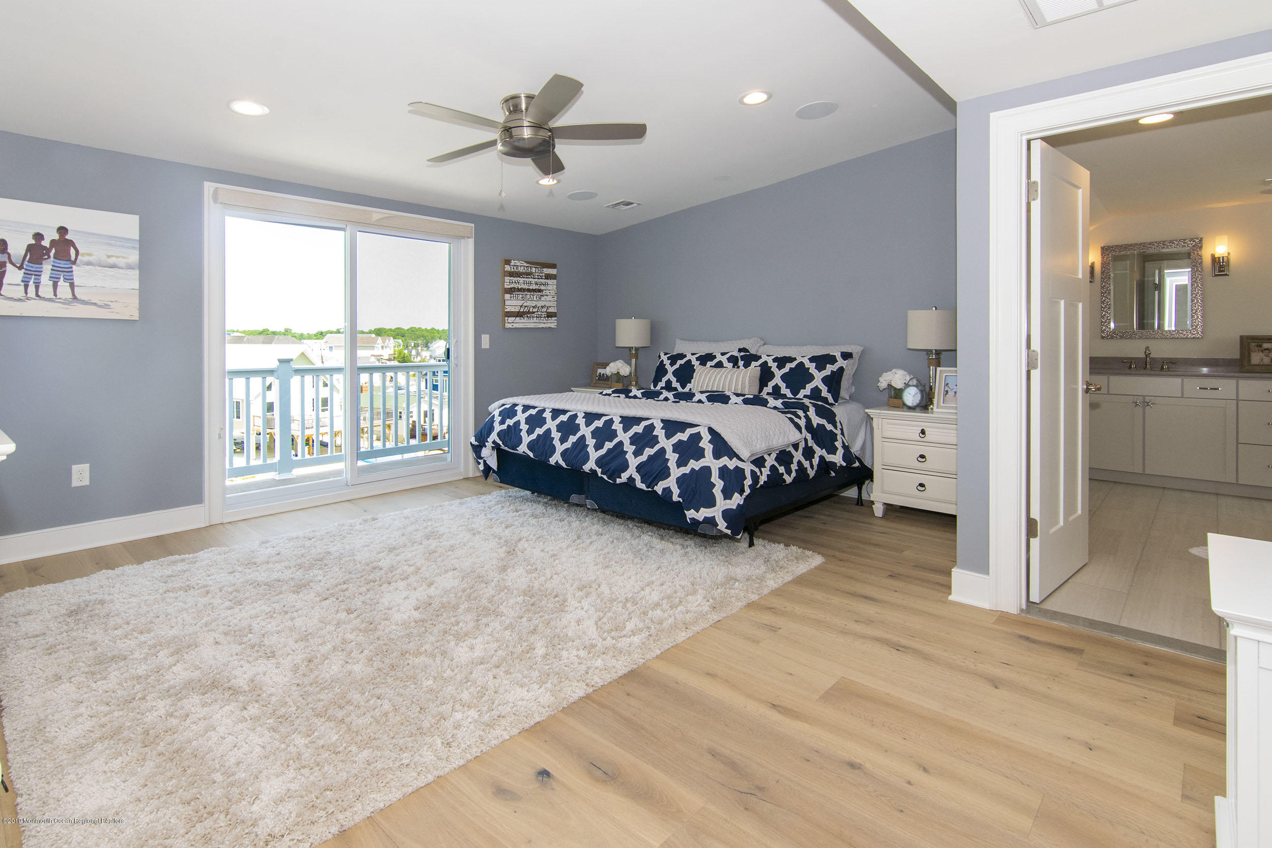30 Ward Drive Brick, NJ 08723 - Photo 31 of 61 a spacious bedroom with a bed and a large window