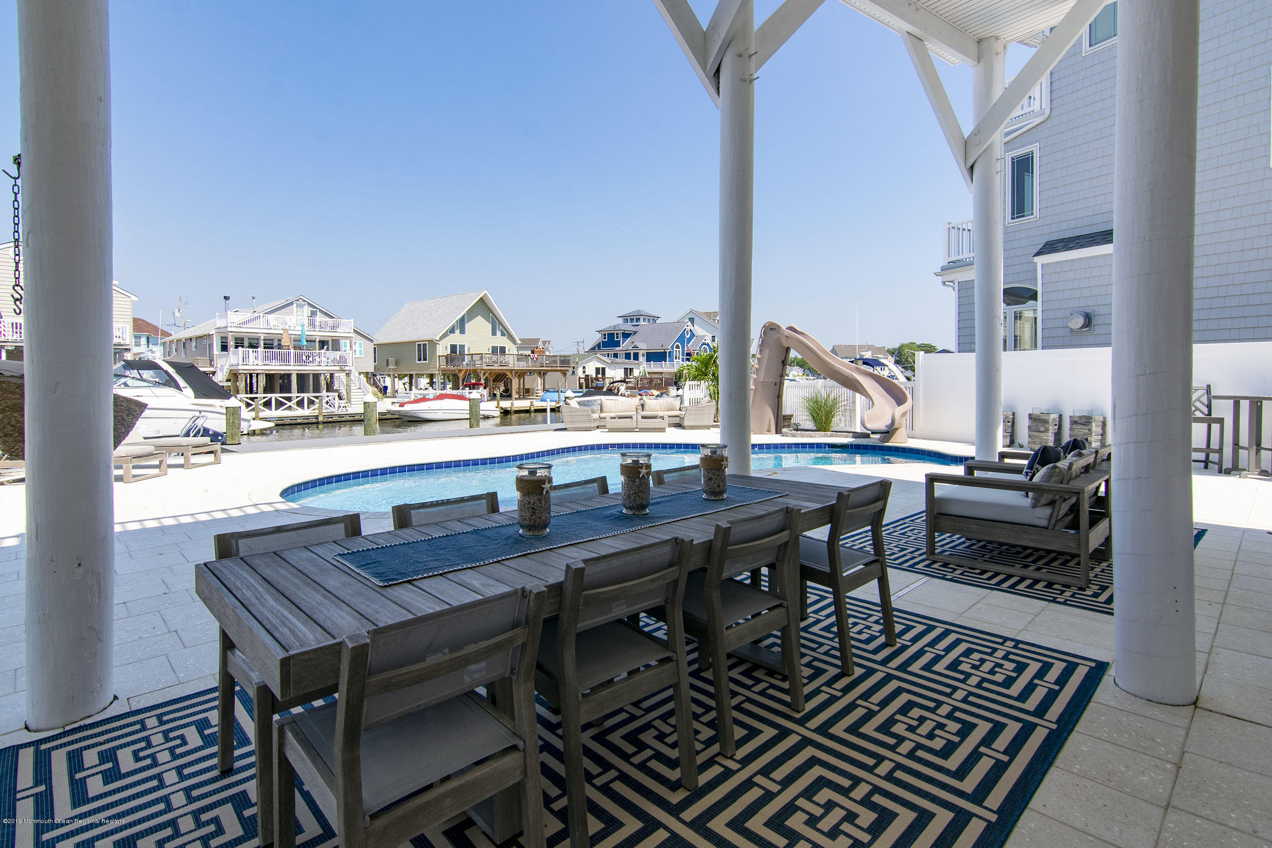 30 Ward Drive Brick, NJ 08723 - Photo 40 of 61 a view of a dining room with furniture window and wooden floor