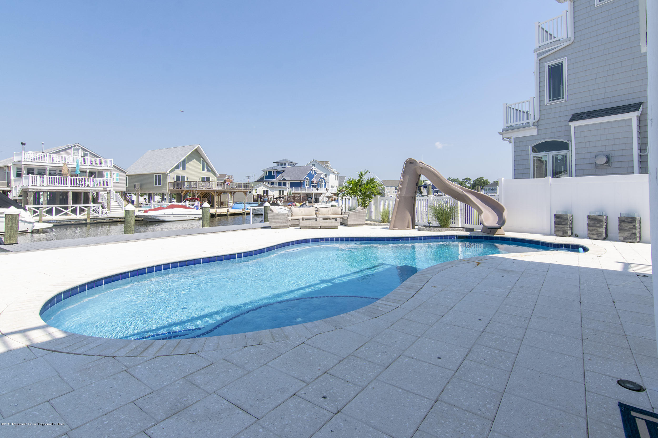 30 Ward Drive Brick, NJ 08723 - Photo 42 of 61 a view of a kitchen with kitchen island and a stove