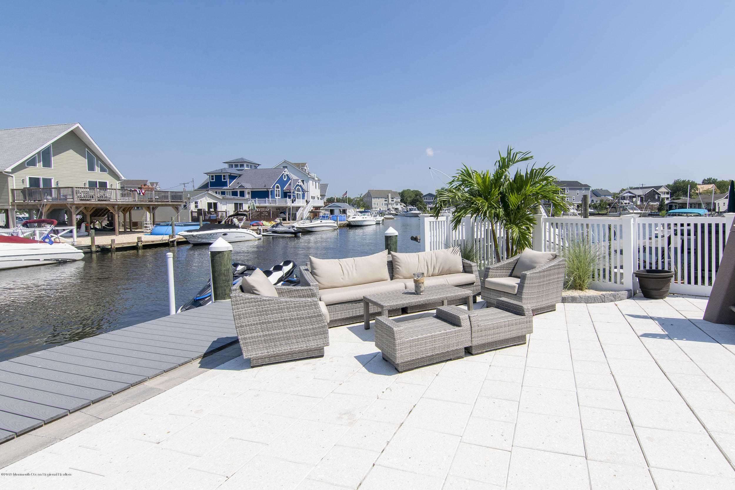 30 Ward Drive Brick, NJ 08723 - Photo 43 of 61 a living room with patio furniture and a table