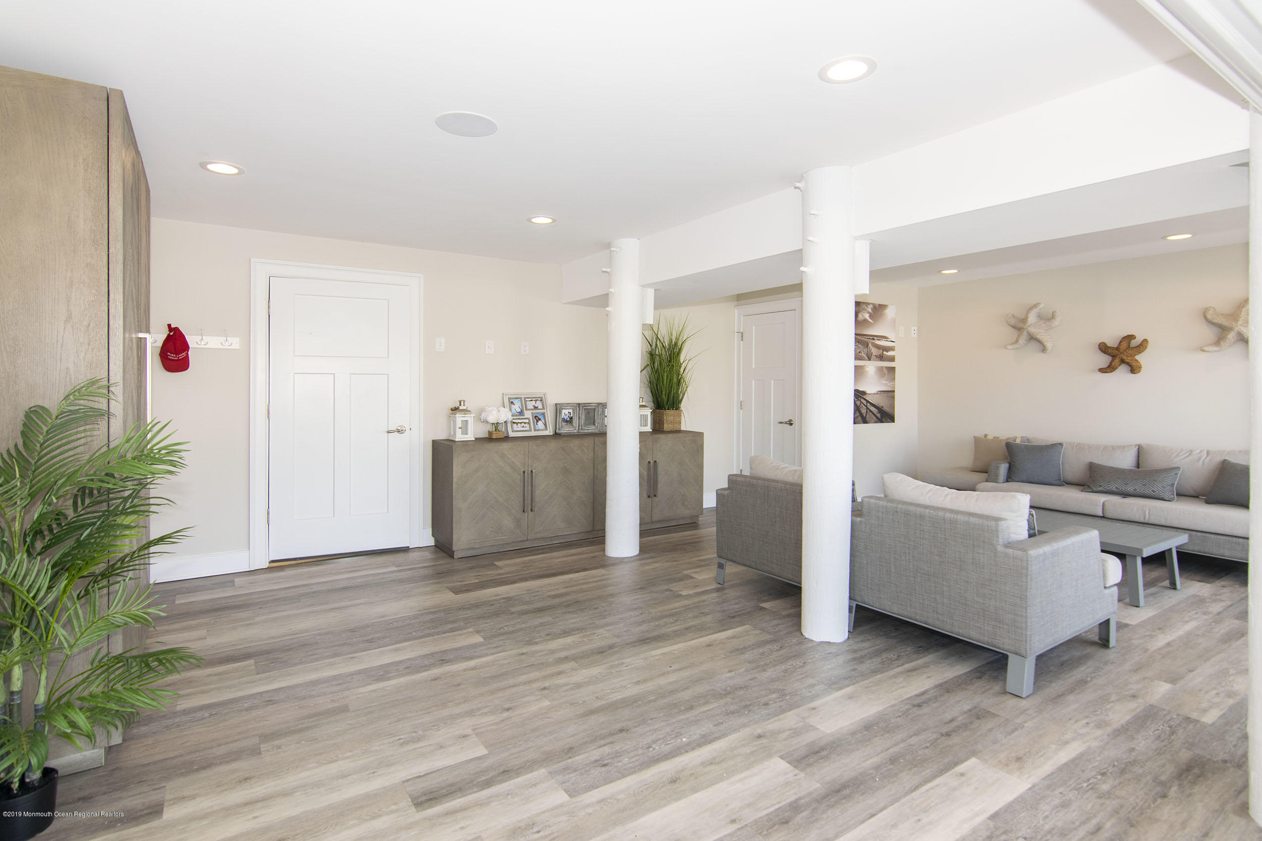 30 Ward Drive Brick, NJ 08723 - Photo 8 of 61 a living room with furniture and a potted plant