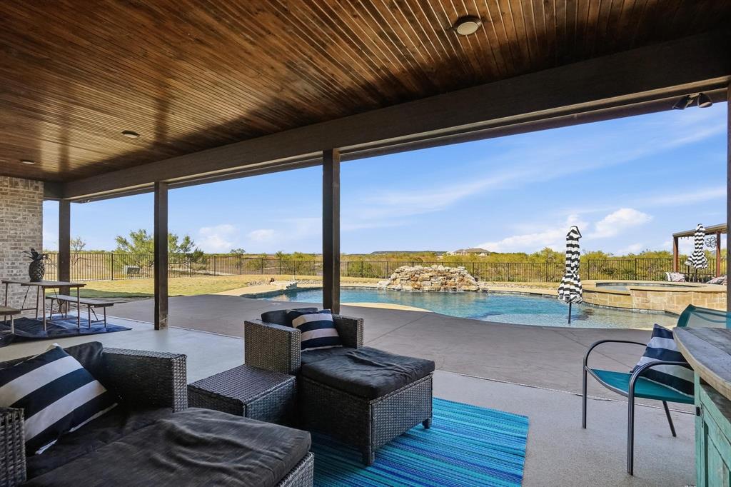 163 Homestead Road Tuscola, TX 79562 - Photo 26 of 40 a view of swimming pool with outdoor seating