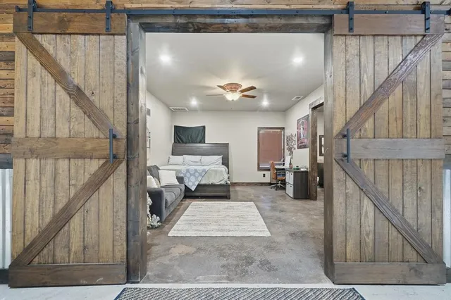 a view of a hallway view with staircase