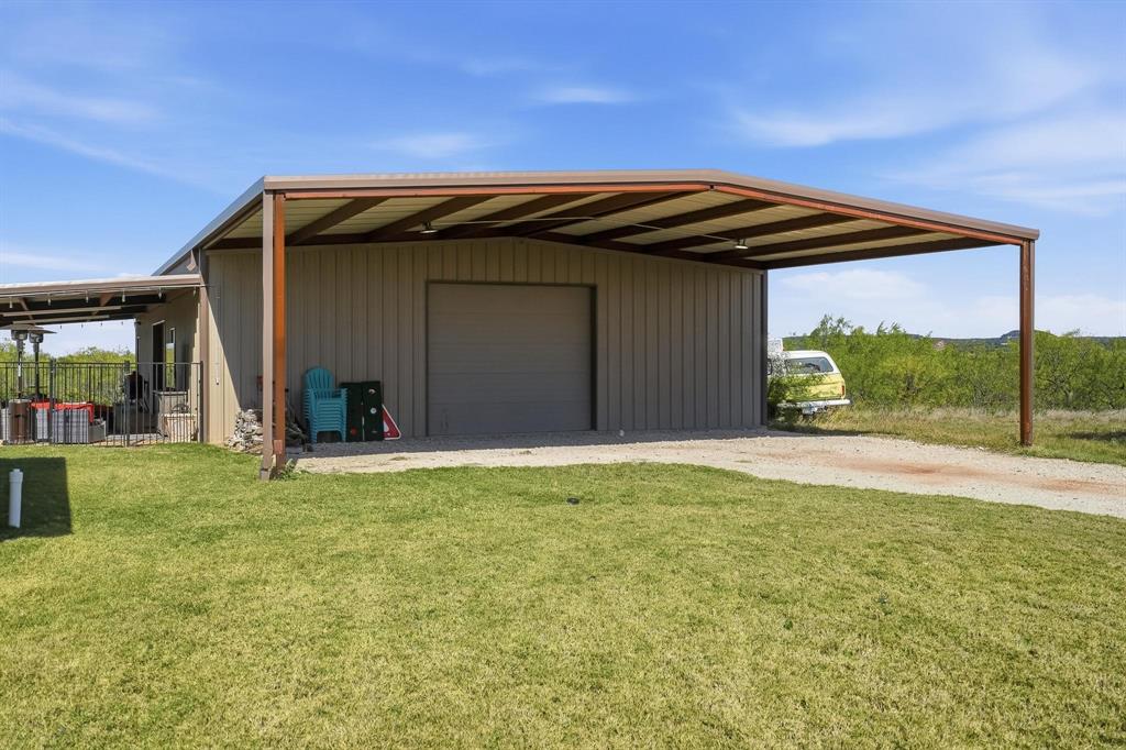 163 Homestead Road Tuscola, TX 79562 - Photo 38 of 40 a view of backyard with seating space