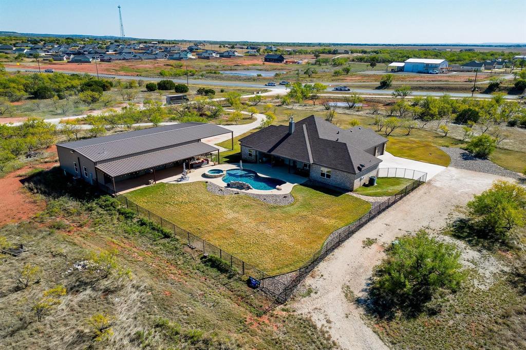 163 Homestead Road Tuscola, TX 79562 - Photo 39 of 40 a view of a swimming pool with an ocean view