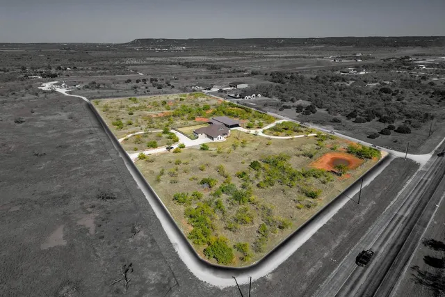 a view of swimming pool from a balcony