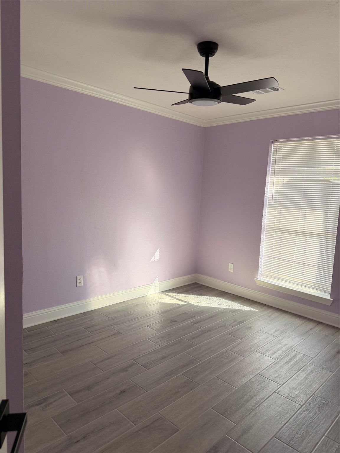 2839 Autumn Springs Lane Spring, TX 77373 - Photo 12 of 49 a view of an empty room with wooden floor and a window