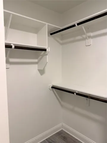 a view of a room with racks on the wall