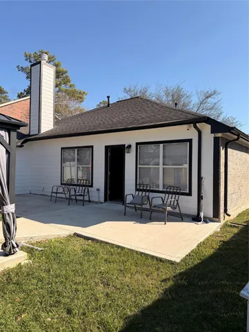 a view of swimming pool with a yard
