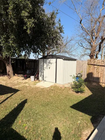 a view of hallway with wooden floor