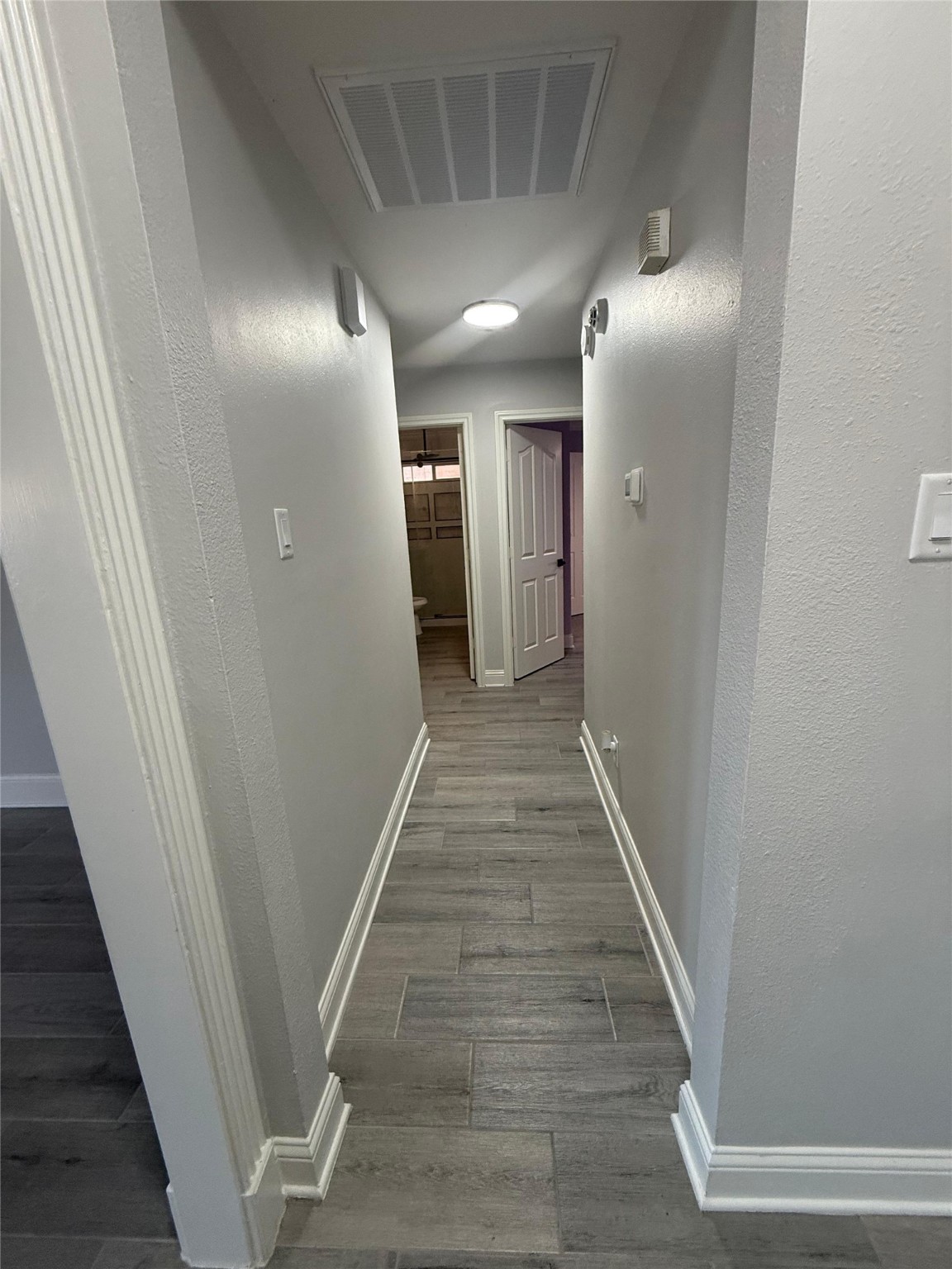 2839 Autumn Springs Lane Spring, TX 77373 - Photo 31 of 49 a view of hallway with wooden floor