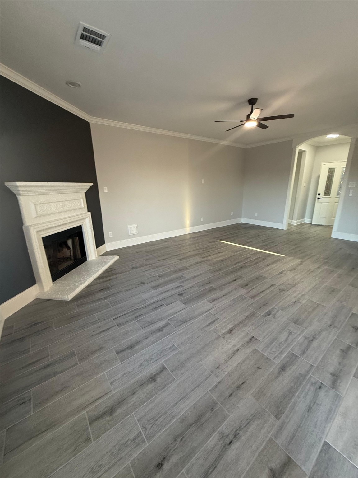 2839 Autumn Springs Lane Spring, TX 77373 - Photo 34 of 49 a view of an empty room with wooden floor and a fireplace