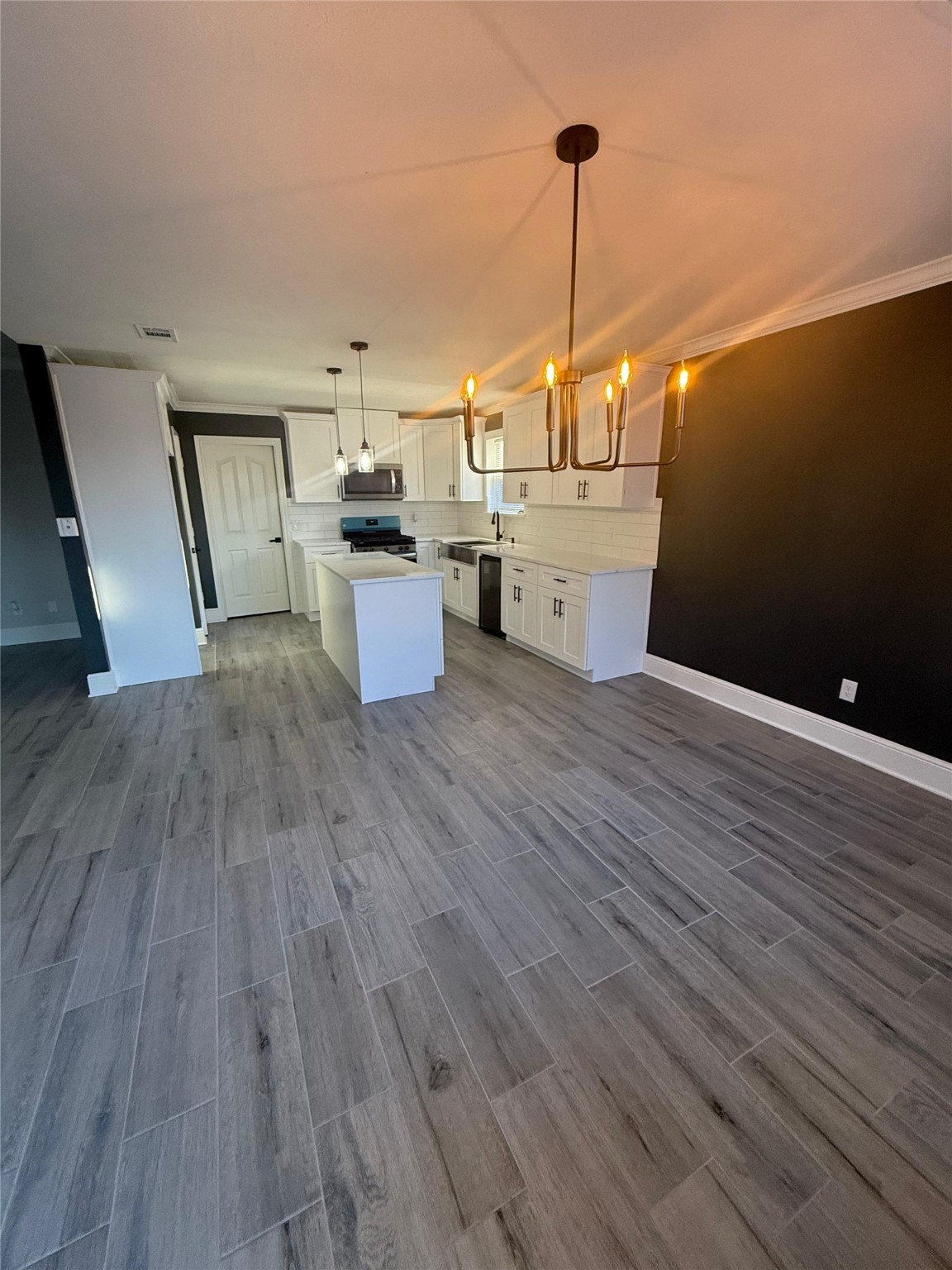 2839 Autumn Springs Lane Spring, TX 77373 - Photo 35 of 49 a view of a kitchen with wooden floor and electronic appliances