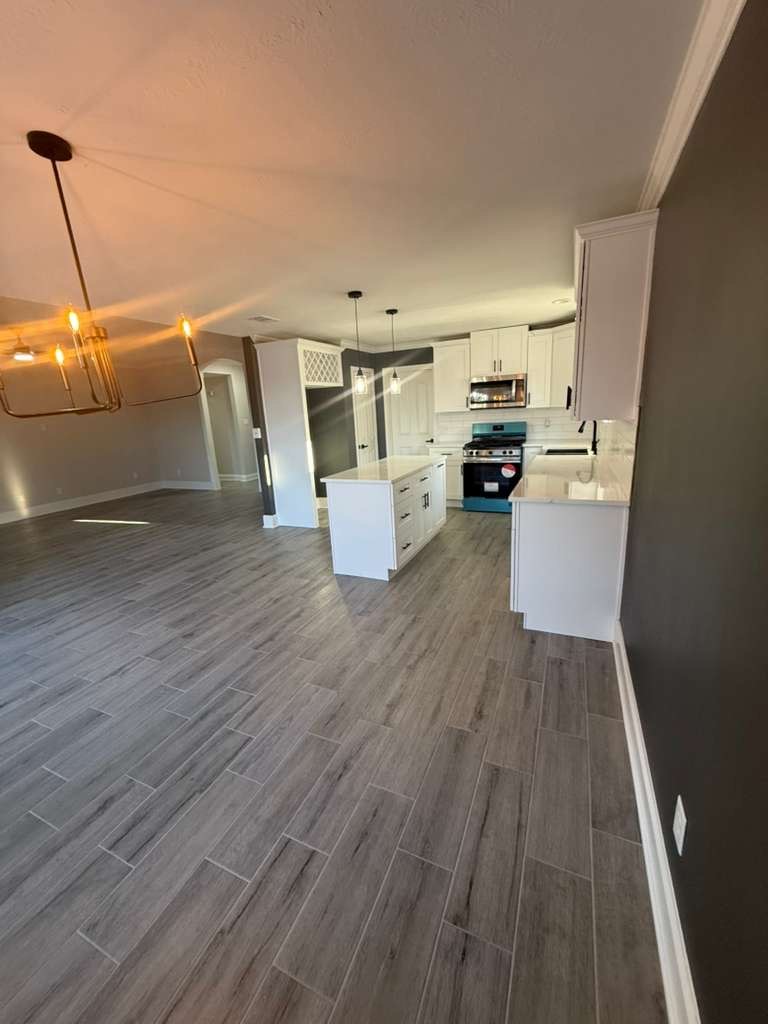 2839 Autumn Springs Lane Spring, TX 77373 - Photo 42 of 49 a view of a kitchen with furniture and wooden floor