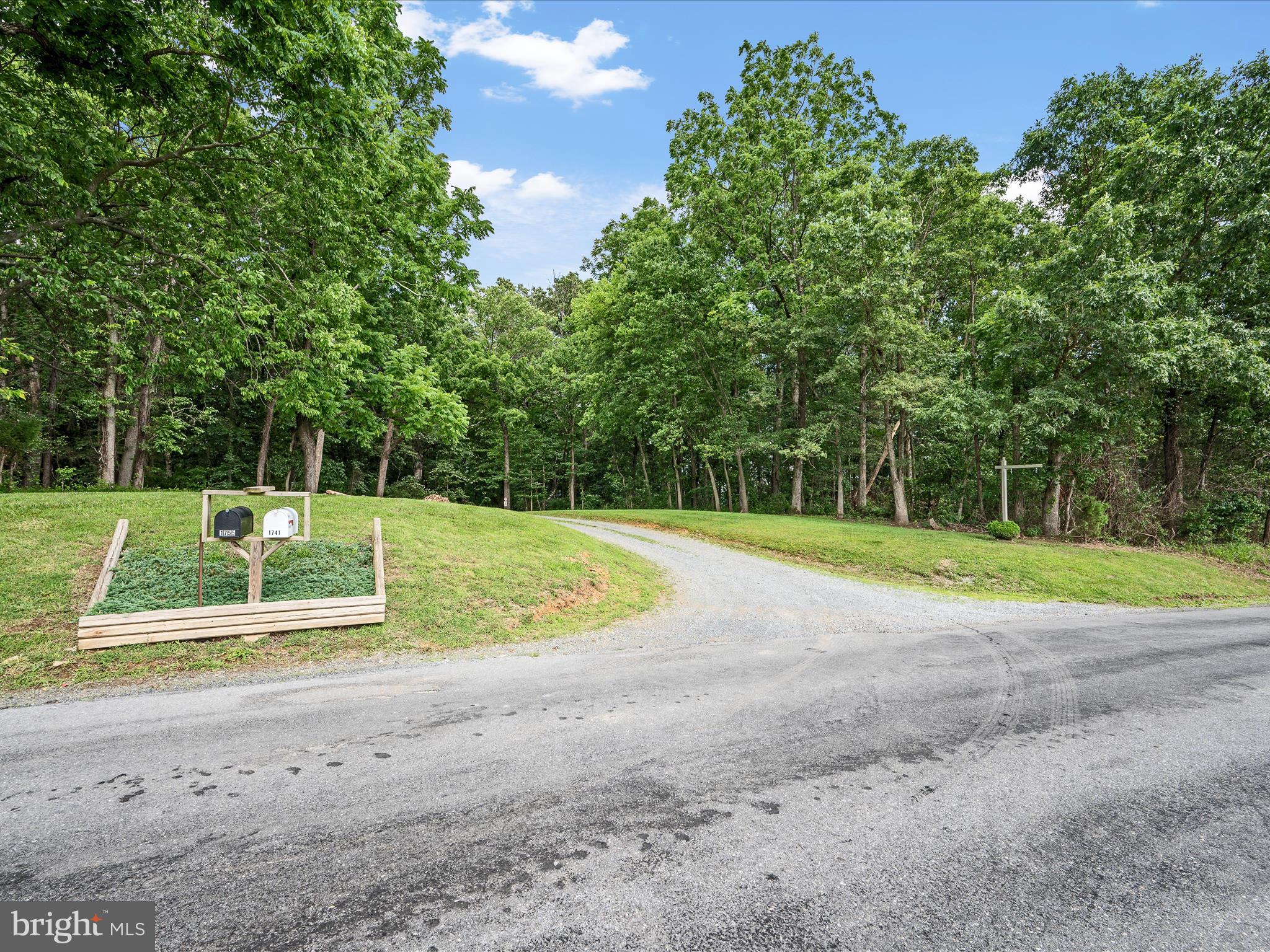 Parshall Berryville, VA 22611 - Photo 5 of 9 a view of a tennis ground with large trees
