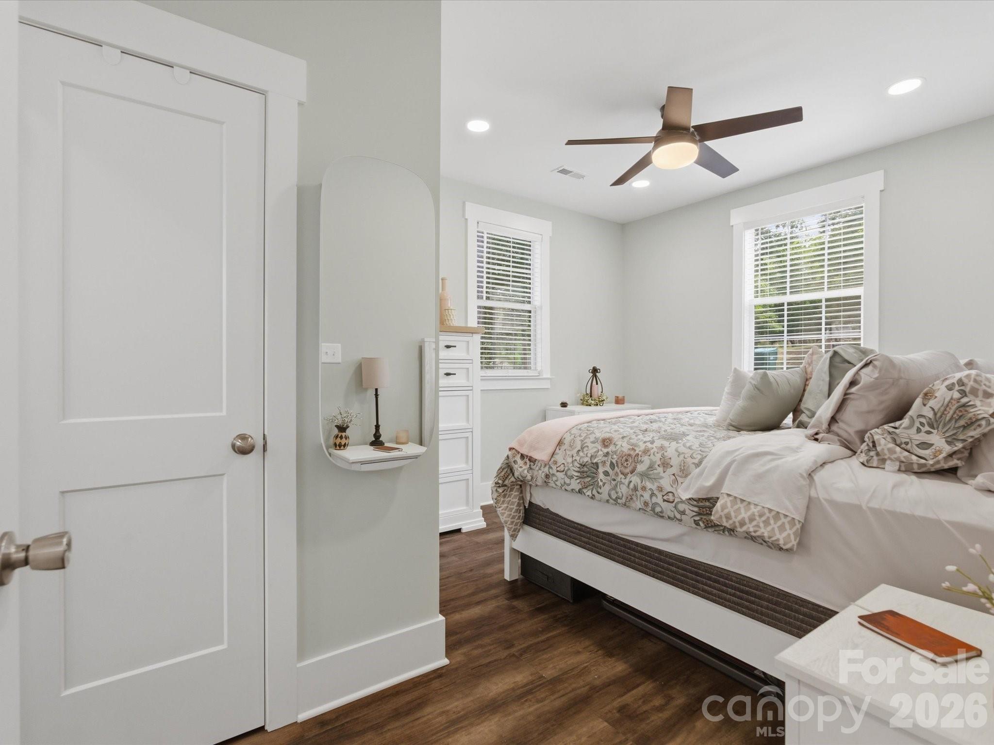 562 Lake Head Road Norwood, NC 28128 - Photo 13 of 43 a bedroom with a bed and a window