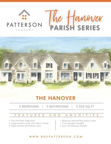 front view of a brick house with a yard