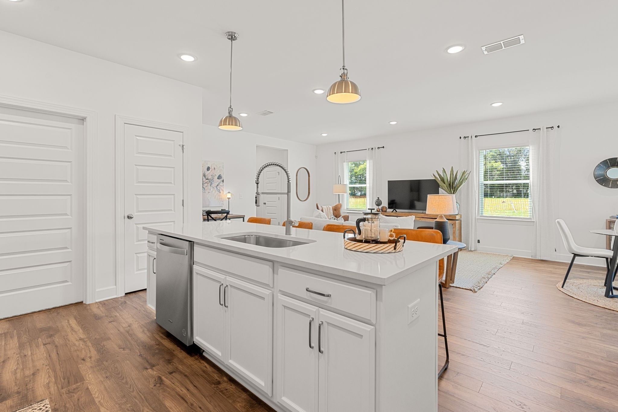 3138 Arbor Vly Road, Unit H8 Spring Hill, TN 37174 - Photo 21 of 27 a kitchen with white cabinets and sink