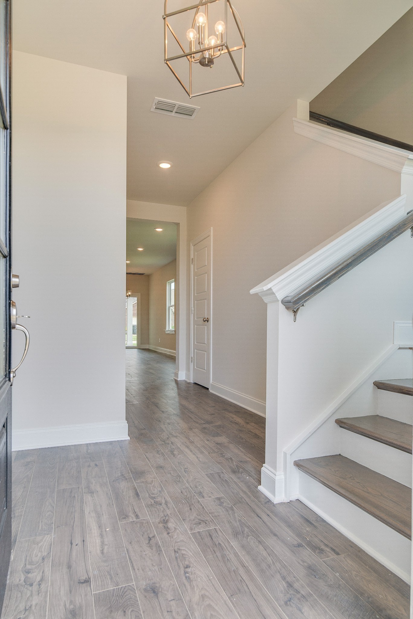 3138 Arbor Vly Road, Unit H8 Spring Hill, TN 37174 - Photo 5 of 27 a view of a hallway with wooden floor