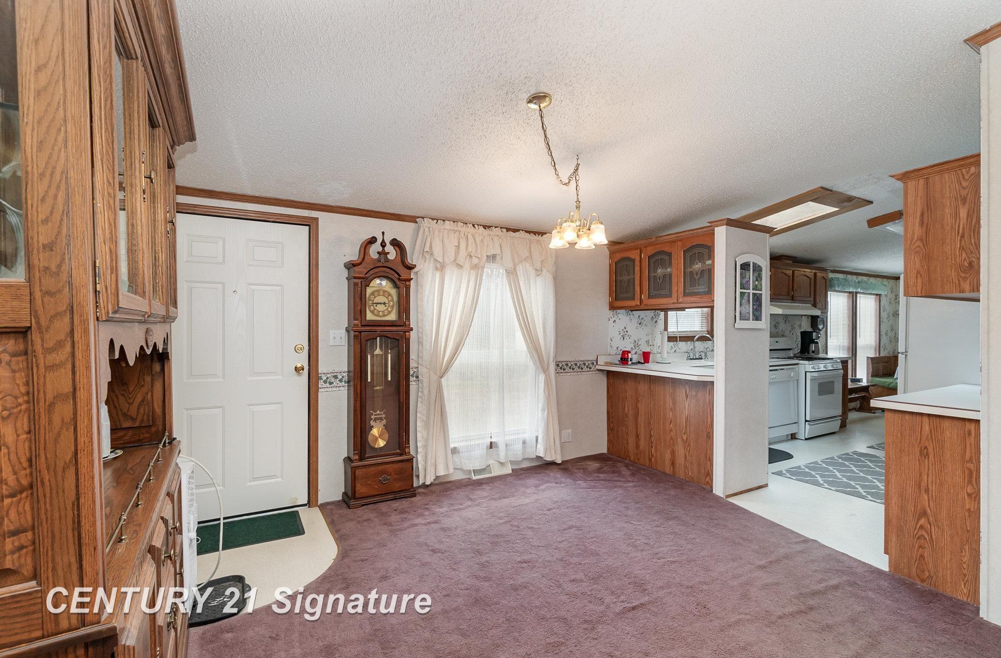 845 East Whitefeather Road Pinconning, MI 48650 - Photo 2 of 27