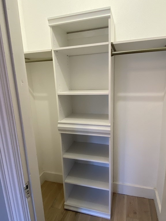 1 Wigglesworth Street, Unit 2 Boston, MA 02120 - Photo 21 of 23 a view of walk in closet with empty racks