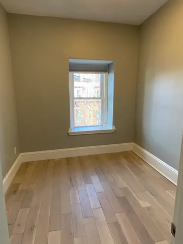 a view of an empty room and window